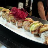 Sunset Roll · Shrimp tempura, cucumber, and crab sticks, cream cheese inside topped with freshwater eel, a...