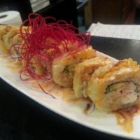 Lone Star Roll · Deep-fried roll with crawfish, crab meat, avocado, and cream cheese, served with house speci...