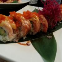 Baked Salmon Roll · California roll wrapped with baked creamy salmon and masago, served with sweet eel sauce, Mi...