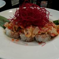 Crazy Crawfish Roll · California roll topped with baked creamy crawfish and masago, served with sweet eel sauce, M...