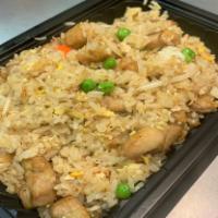 Lucky Fried Rice · Light soy sauce, butter, peas and carrot, white onions, bean spouts and egg.