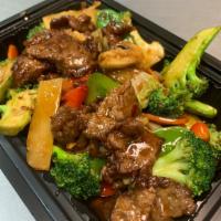 Hunan · Chili brown sauce.broccoli, red bell peppers, snow peas, green bell peppers, white onion, mu...