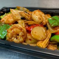 Black Bean Sauce · Spicy brown black bean sauce, red bell pepper, white onions, baby corn, water chestnuts and ...