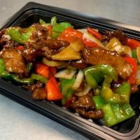 Pepper Steak · Brown sauce, Beef with white onions, green bell pepper and red bell pepper.