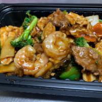 Happy Family · Brown sauce, shrimp, beef and chicken stir-fried with broccoli, snow peas, green bell pepper...