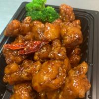 General Tso Chicken · Sweet chili red-brown glaze. Hot and spicy.