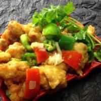 Crispy Chicken · Crispy breaded thigh meat toasted with jalapeno spices, green bell peppers, red bell peppers...
