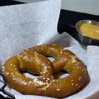 Beer Pretzel · Served with growlers signature beer cheese sauce.