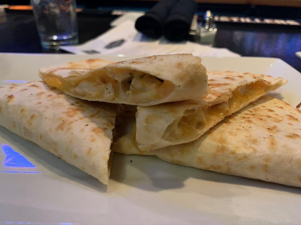 Quesadilla · Served with guacamole, sour cream, and pico de gallo. Add chicken, pork and,shrimp for an additional charge.