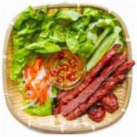 Nem Nuong Platter · Served with white rice pepper, fresh greens, herbs, rice vermicelli, roasted peanuts, crispy...