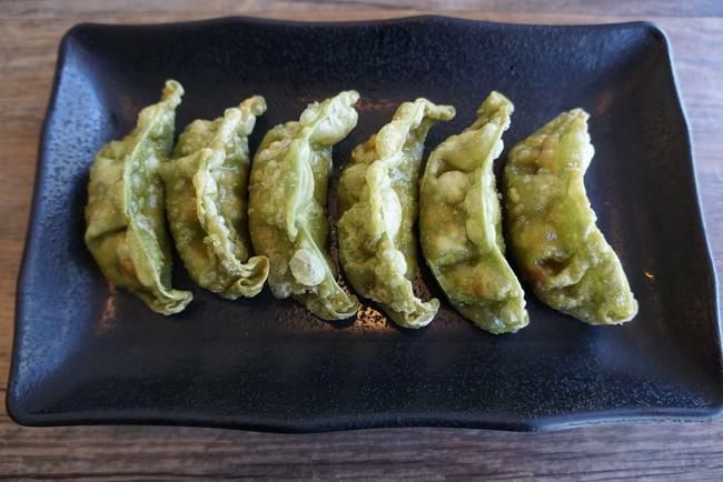 Deep Fried Veggie Gyoza · Deep fried tofu and vegetable dumplings in an edamame wrapper.