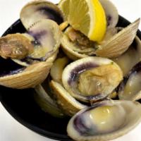 Miso Garlic Clams · Steamed clams sauteed in our miso garlic butter.