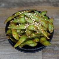 Spicy Miso Soybeans · Steamed soybeans tossed in miso and Hawaiian chili peppers, topped with roasted sesame seeds.