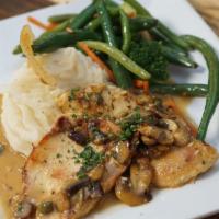 Chicken Piccata  · Sauteed with mushrooms, herbs and finished in wine with garlic mashed potatoes.