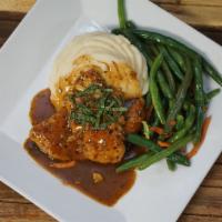 Chicken Marsala · Sauteed with mushrooms, herbs and finished in wine with garlic mashed potatoes.