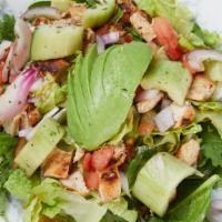 Asian Sesame Ginger Salad · Chicken or steak, tomatoes, cucumbers, red onions, sesame
seeds, craisins, avocado, and Asi...