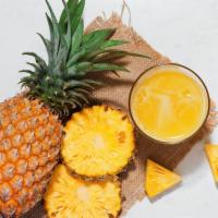 Pineapple Smoothie · Tropical blend of pineapple and ripe banana.