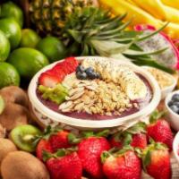 Acai Bowl · Organic blend of acai, strawberry, blueberry and banana, topped with granola, coconut flakes...
