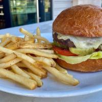 The 908 Burger · House blend patty, pickle & 1000 Island, gruyere, lettuce, tomato, brioche bun & fries.