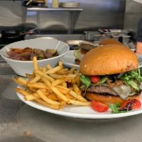 Knife & Fork Burger · pepper crusted patty, blue cheese, avocado, tomato, pickle, caramelized onions & brioche bun 