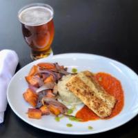 Pistachio Panko Crusted Halibut · Roasted vegetables, garlic thyme mashed potatoes & red pepper buerre blanc puree.