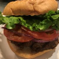Hamburger · 1/4 lb Angus beef with lettuce, tomatoes, red onions and mayo on a Brioche Bun.