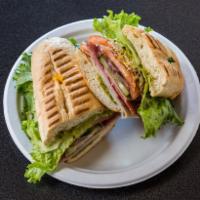 Italian Hero · Roasted turkey, honey ham, salami, cucumber, red onions, lettuce, tomatoes, sprouts and prov...
