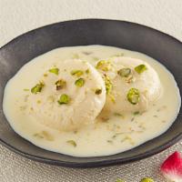 Ras Malai · Ras Malai is Indian cottage cheese dumplings in cream milk sauce, flavored with pistachios ,...