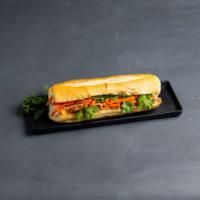 #7. Tofu Sandwich · house mayonnaise, cucumber, pickled carrots & daikon, jalapenos , and cilantro served on Fre...