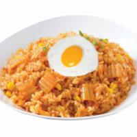 Kimchi Fried Rice · Stir fried rice with vegetables and kimchi base.