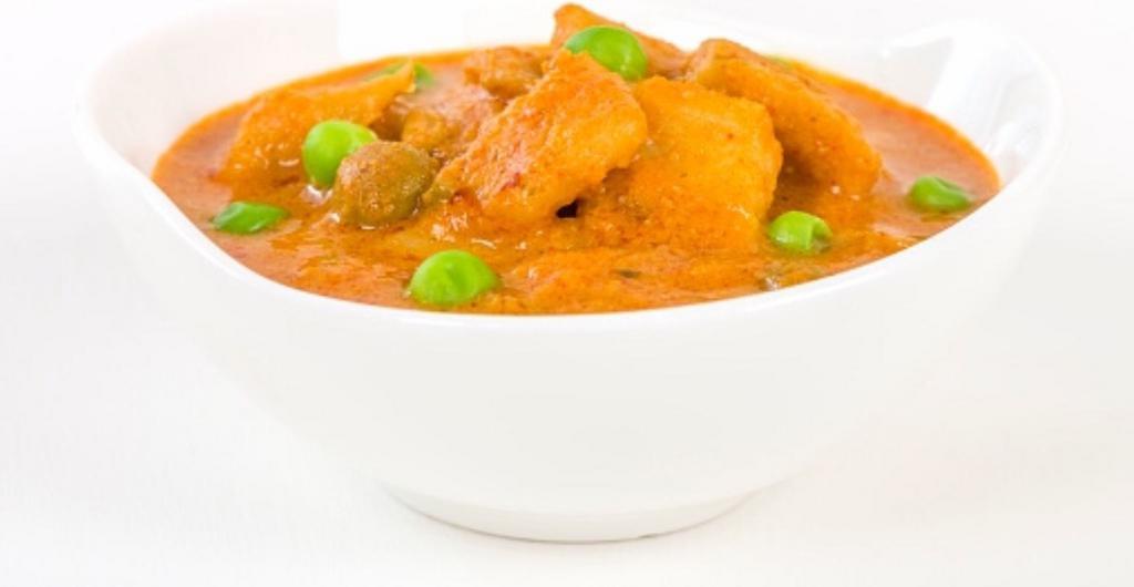 Aloo Muttar Masala · Fresh potato cubes cooked with peas, curry and herbs.