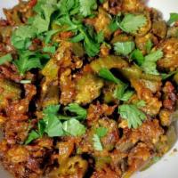 Bhindi Masala · Dry okra pan fried with onions, herbs and spices.