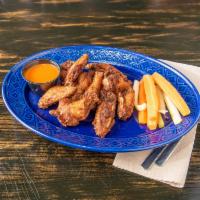 Bone in Wings · Bone in wings with your choice of sauce.