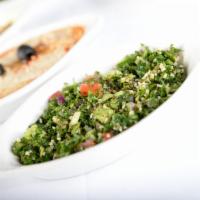 Tabuli Salad · bulgur wheat, diced tomato, onion, cucumber, parsley with olive oil and lemon juice