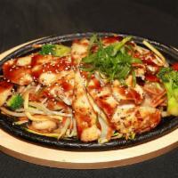 Chicken Teriyaki · Marinated grilled chicken with teriyaki sauce. Served with miso soup and steamed rice.