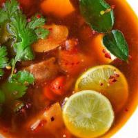 13. Tom Yum Small · Savory hot and sour soup with mushrooms, tomatoes, onions, lemongrass, galangal and lime lea...