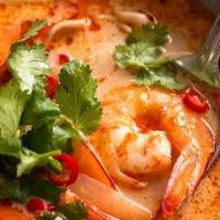14. Tom Kha Small · Creamy coconut soup with mushrooms, tomatoes, onions, lemongrass, galangal and lime leaves.