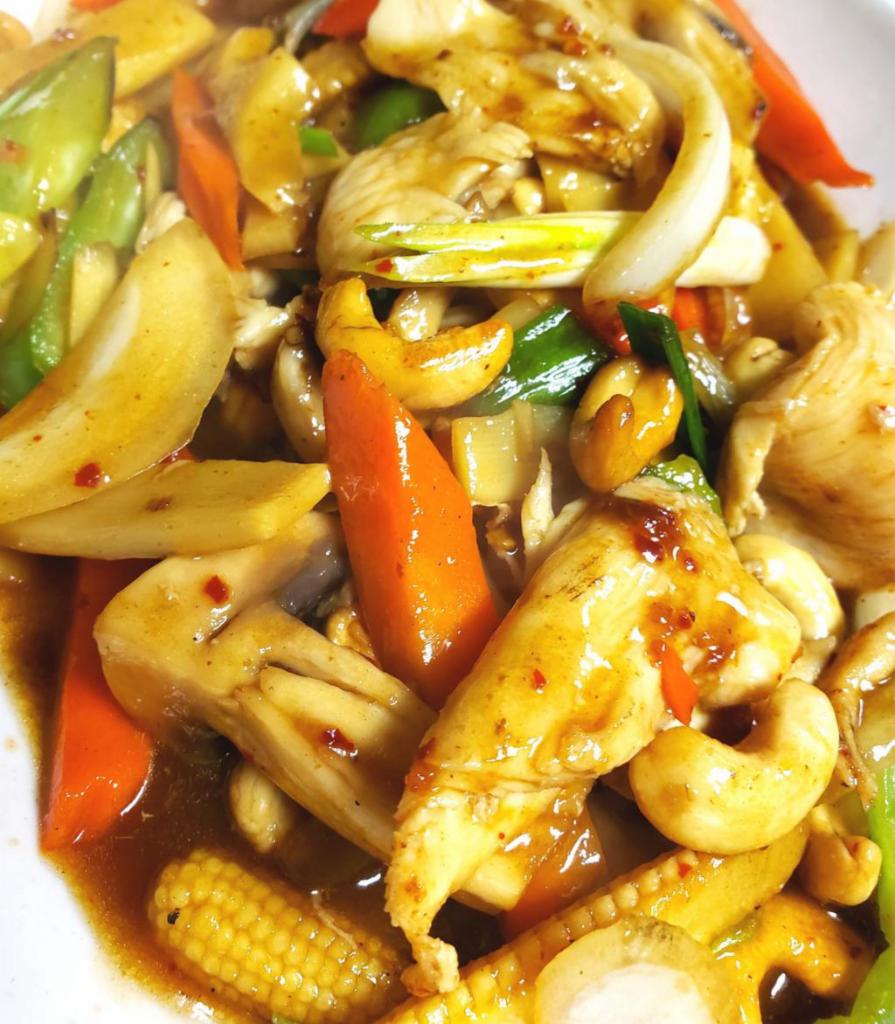 36. Cashew Delight · Roasted cashew nuts with bell peppers, onions, carrots, bamboo shoots, mushrooms and baby corn.