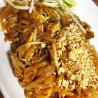 39. Pad Thai · Rice noodles with eggs, onions, crushed peanuts and beans sprouts.