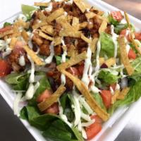 BBQ Chicken Salad · 4 oz of diced chicken marinated in BBQ sauce. Served on a bed of romaine lettuce with Fresh ...