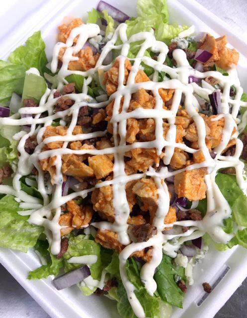 Buffalo Chicken Salad · 4 oz of diced chicken marinated in Mama Z's Buffalo Mild Sauce. Served on a bed of romaine lettuce with Bacon, Onion, Bleu Cheese Crumbles and Mozzarella