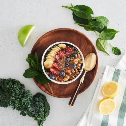 Healthy Blast Bowl · The ultimate superfood smoothie made with juiced apple, with spinach, kale, ginger, lemon, mint, strawberries, blueberries, banana, spirulina, and probiotics. Topped with granola, almond butter, strawberries, blueberries, bananas, hemp seeds and local honey.