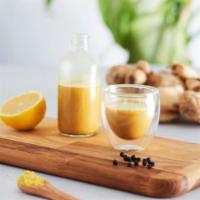 Earthy Gold Shot · This anti-inflammatory powerhouse contains ginger, lemon, local honey, maca, black pepper, a...