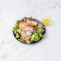 Dorado Salad · Spring mix, tomato, avocado, pepitas, queso blanco and honey lime vinaigrette.