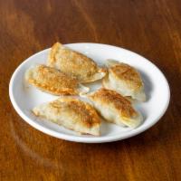 Fried Mando · Dumplings with pork and vegetable.