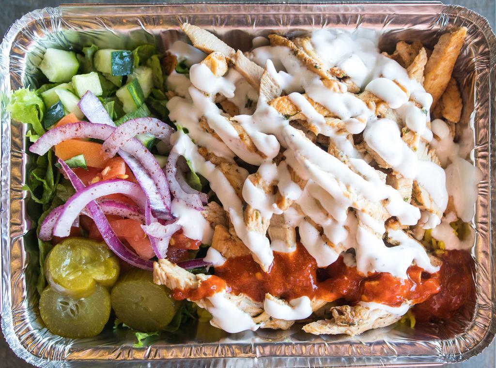 Chicken Shawarma over Rice · Marinated chicken breast, thin sliced over spiced basmati rice and a side salad. Served with our white sauce and hot sauce.