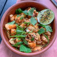 Crispy Sesame Calamari · red chili aioli, thai basil, lime