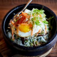 Vegetable Bibimbap · Sushi rice, shiitake mushrooms, edamame, spinach, house-made kimchee, and sunny up egg.