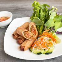 Cha Gio-Egg Rolls (4 Rolls) · Deep fried eggs rolls filled with ground pork and shrimp, lettuce, herbs and our famous hous...