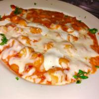 Gnocchi · Potato dumpling pasta tossed with our mascarpone tomato sauce finished in the oven with a bl...